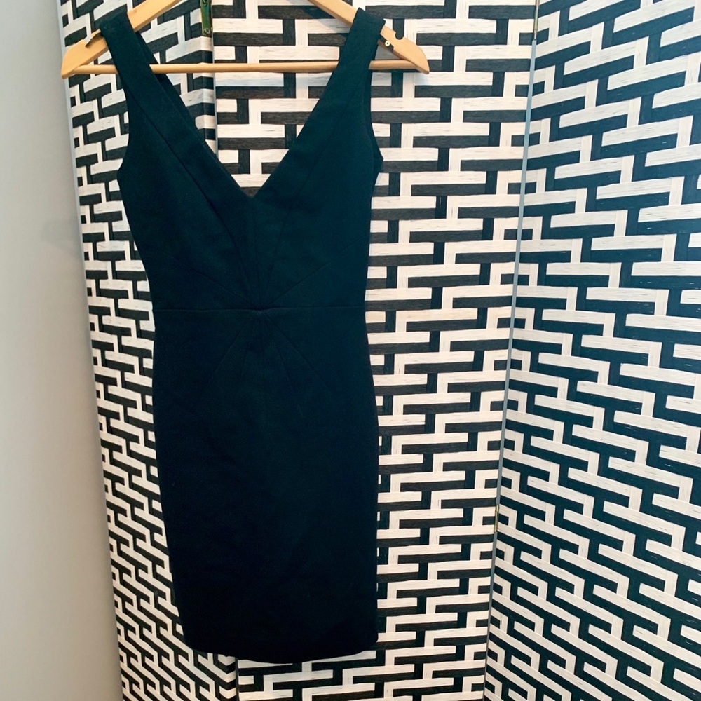 GORGEOUS black fitted mini dress.